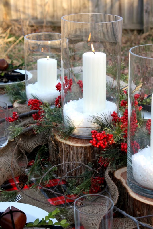 Candles and holly berries