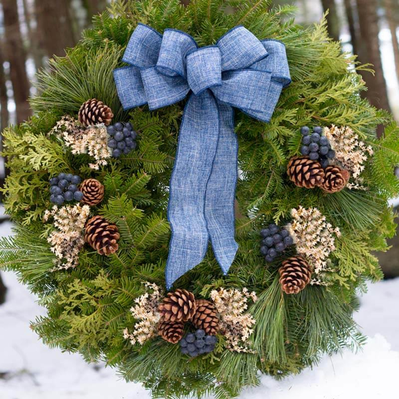 A Harbor Farm wreath featuring white statice instead of reindeer moss
