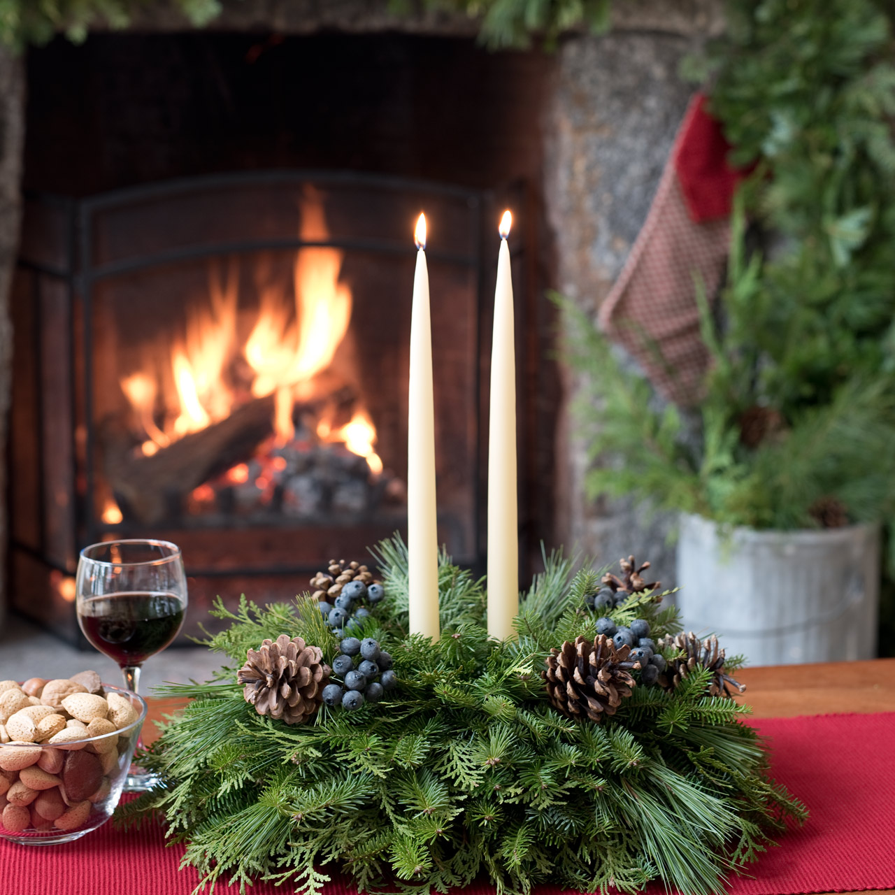 blueberry-fresh-table-centerpieces-ivory-candles-fireplace.jpg
